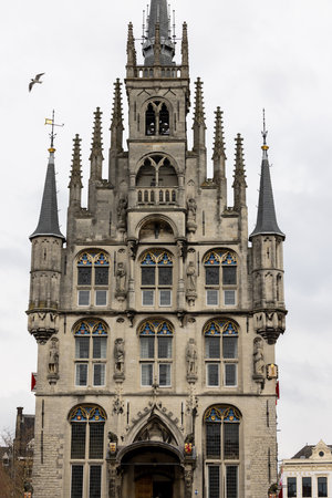 Gouda, the Netherlands - The Old Gouda City Hall at the Markt square. It was one of the oldest Gothic city halls in the Netherlands.の写真素材