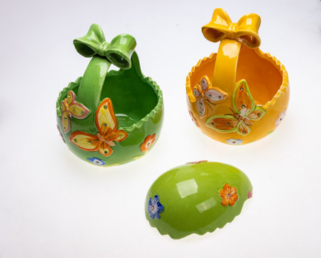 Colorful ceramic Easter decorations with butterfly motifsの写真素材