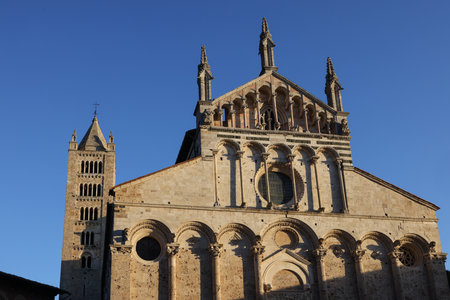 The Cathedral of Saint Cerbonius with Bell tower at the Garibaldi square in Massa Marittima. Italyの写真素材