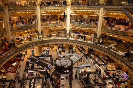 Paris, France - March 18, 2025: Galeries Lafayette interior in Paris. The architect Georges Chedanne designed the store with a Art Nouveau glass and steel domeのeditorial素材