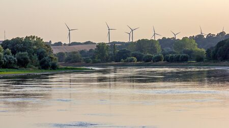 Wind farm at the lakeの写真素材