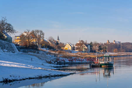 winter on the elbe with a ship ferryの写真素材