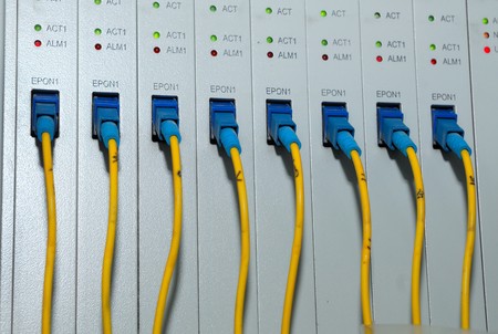 network hub and patch cables,Fiber cables connected to servers in a datacenter 