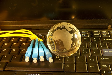 world map technology style against fiber optic background 