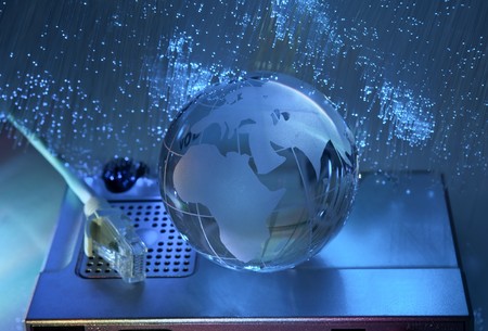 globe with network on technology fiber optics background の写真素材