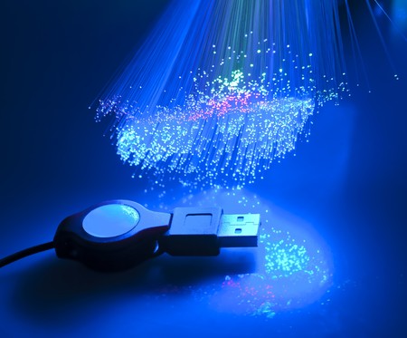 USB plugs closeup with fiber optical background 