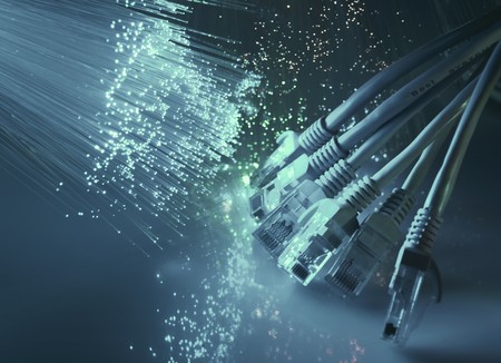 network cable closeup with fiber optical backgroundの写真素材