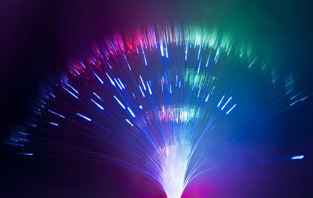 bunch of optical fibres dinamic flying from deep on technology background 
の写真素材
