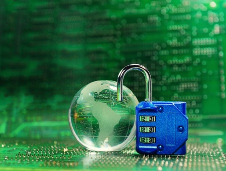 Lock and world map with computer keyboard background の写真素材