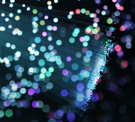 bunch of optical fibres dinamic flying from deep on technology background 