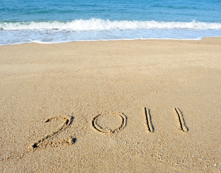 Shot of 2011 year on sandの写真素材