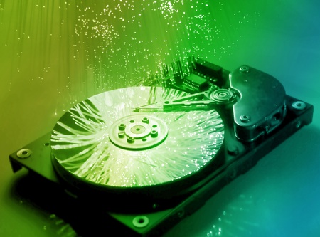 harddisk isolated on with fiber optical background 