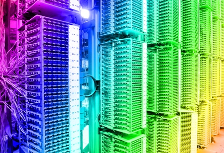 shot of network cables and servers in a technology data centerの写真素材