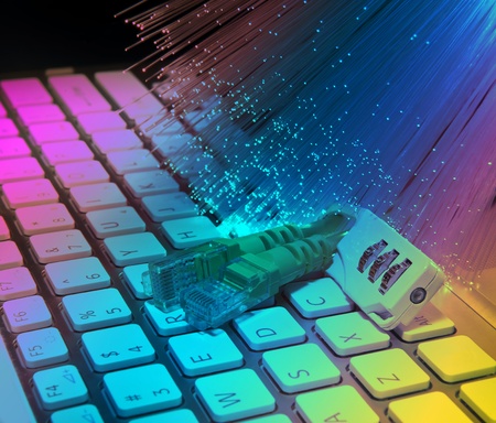 Lock and network cable with computer keyboard background 
の写真素材
