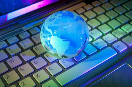 technology earth globe against fiber optic backgroundの写真素材