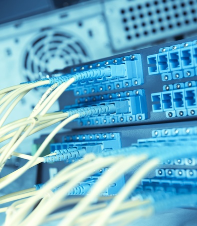 shot of network cables and servers in a technology data centerの写真素材