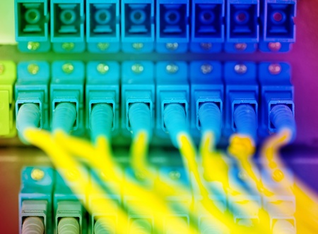 shot of network cables and servers in a technology data center