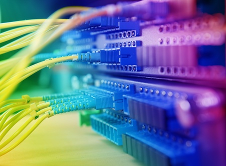 shot of network cables and servers in a technology data center 