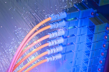network cables and servers in a technology data center 