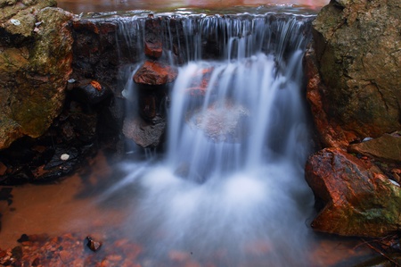 Autumn waterfall is beautiful