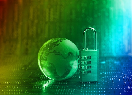 Lock and network cable with computer keyboard background の写真素材