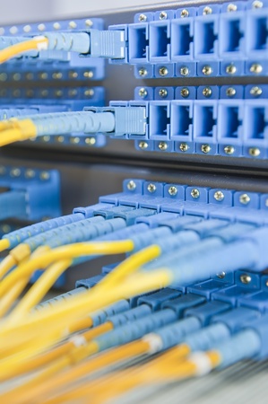 network cables and servers in a technology data centerの写真素材