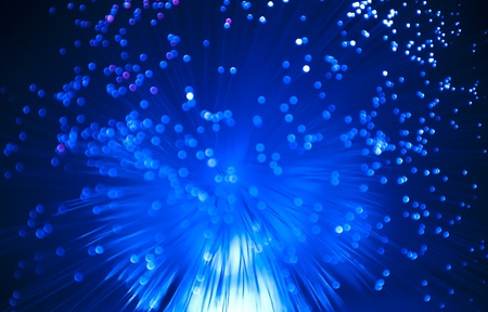 bunch of optical fibres dinamic flying from deep on technology background 