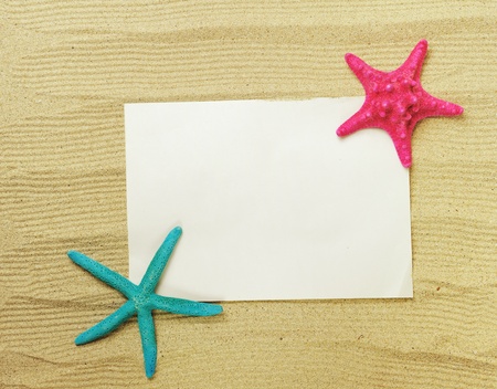 starfish and shells with frame on the beach, vacation memories の写真素材