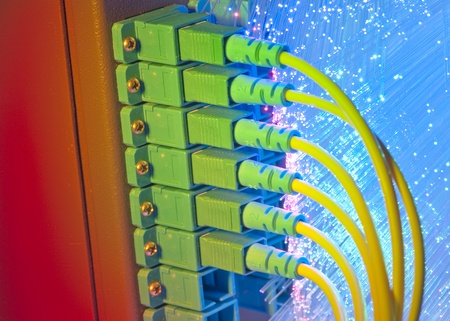 shot of network cables and servers in a technology data center