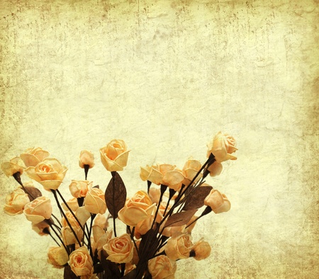 rose on Old antique vintage paper background の写真素材