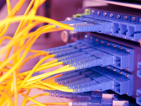 shot of network cables and servers in a technology data center 