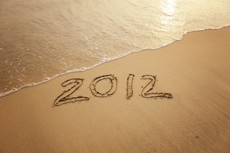 2012 new year message on the sand beach