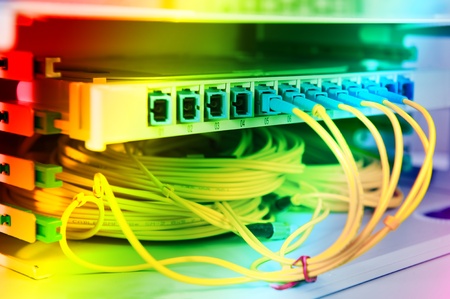 network hub and patch cables,Fiber cables connected to servers in a datacenter(