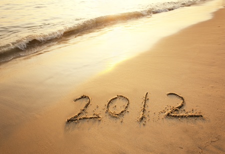 happy new year 2012 on the beach of sunriseの写真素材