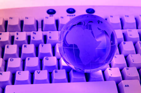 technology earth globe against fiber optic backgroundの写真素材