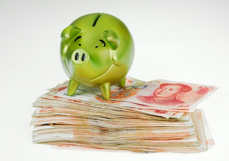 piggy bank and one-hundred rmb billの写真素材