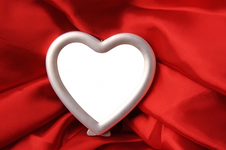hearts copyspace photo frame on red silkの写真素材