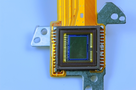CCD sensor on a card of digital camera with fiber optical backgroundの写真素材
