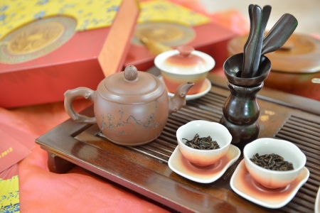 Traditional chinese tea pot and tea pair on the tea tableの写真素材