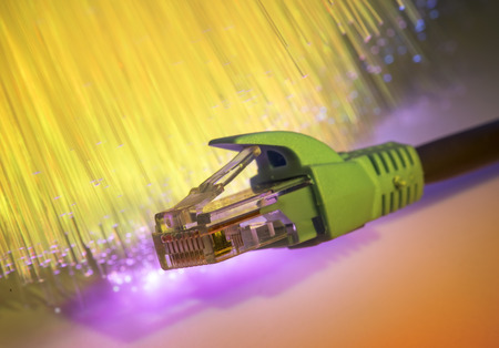 network cable with high tech technology color backgroundの写真素材