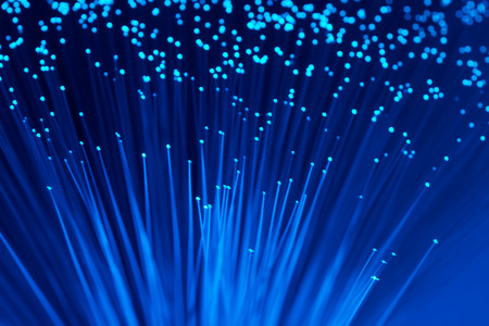 optical fibres dinamic flying from deep on technology backgroundの写真素材