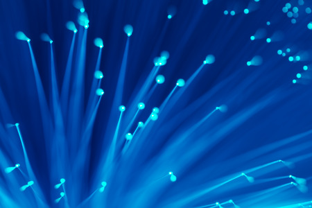 optical fibres dinamic flying from deep on technology backgroundの写真素材