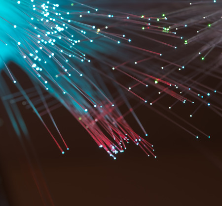 bunch of optical fibres dinamic flying from deep on technology background