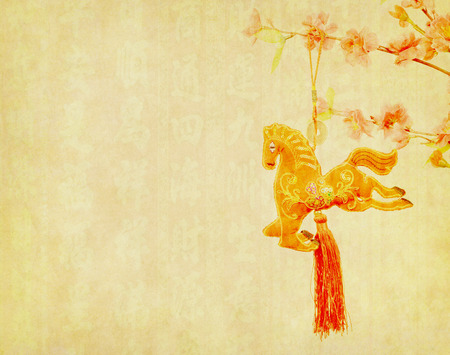 chinese horse knot on old paper background, word for "horse", 2014 is year of the horseの写真素材