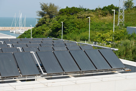 Solar water heating panel on a house roof