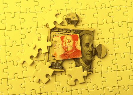 Dollar and Yuan on Puzzleの写真素材
