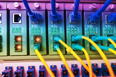 Fiber Optic cables connected to an optic port