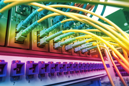 Fiber Optic cables connected to an optic port