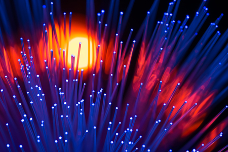 optical fibres dinamic flying from deep on technology backgroundの写真素材