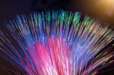 optical fibres dinamic flying from deep on technology backgroundの写真素材